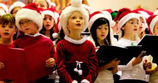 Children Singing Carols in Worship